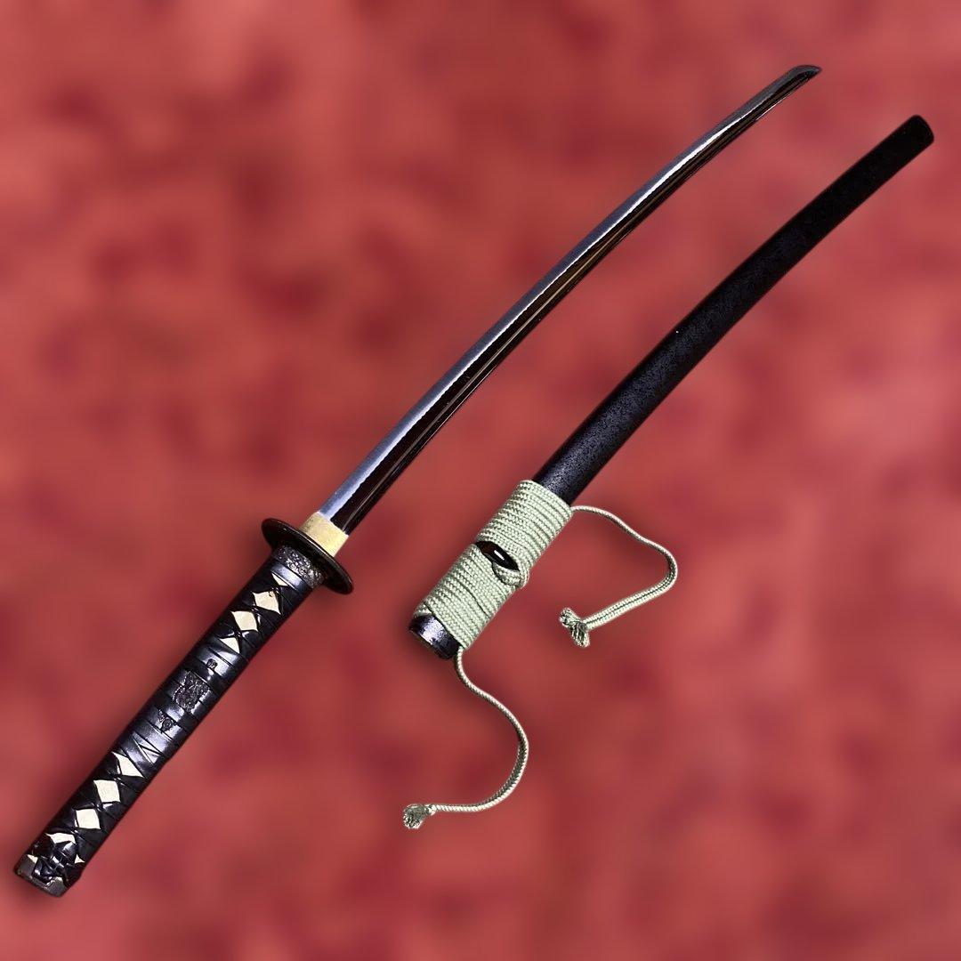 豪華居合刀 黒革巻柄 鶴松図楕円鍔 黒梨地鞘 - メルカリ