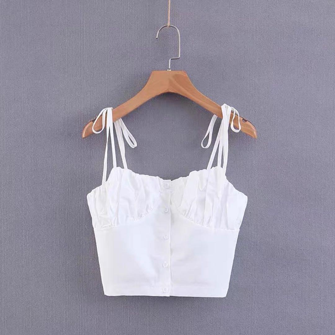 フリル付きホワイトキャミソール - メルカリ