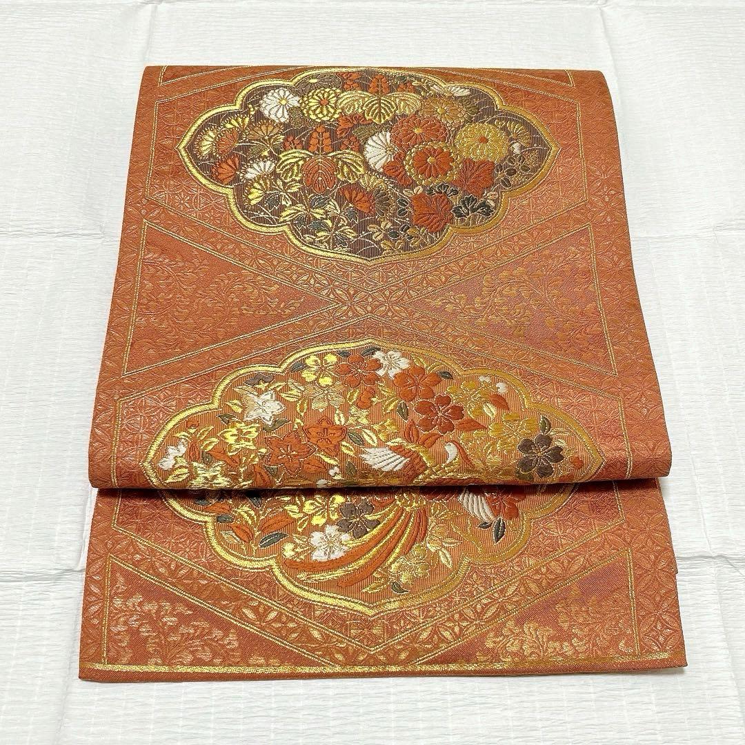 梅垣織物 袋帯 西陣織 七宝菱蒔絵文 正絹 金糸 オレンジゴールド系