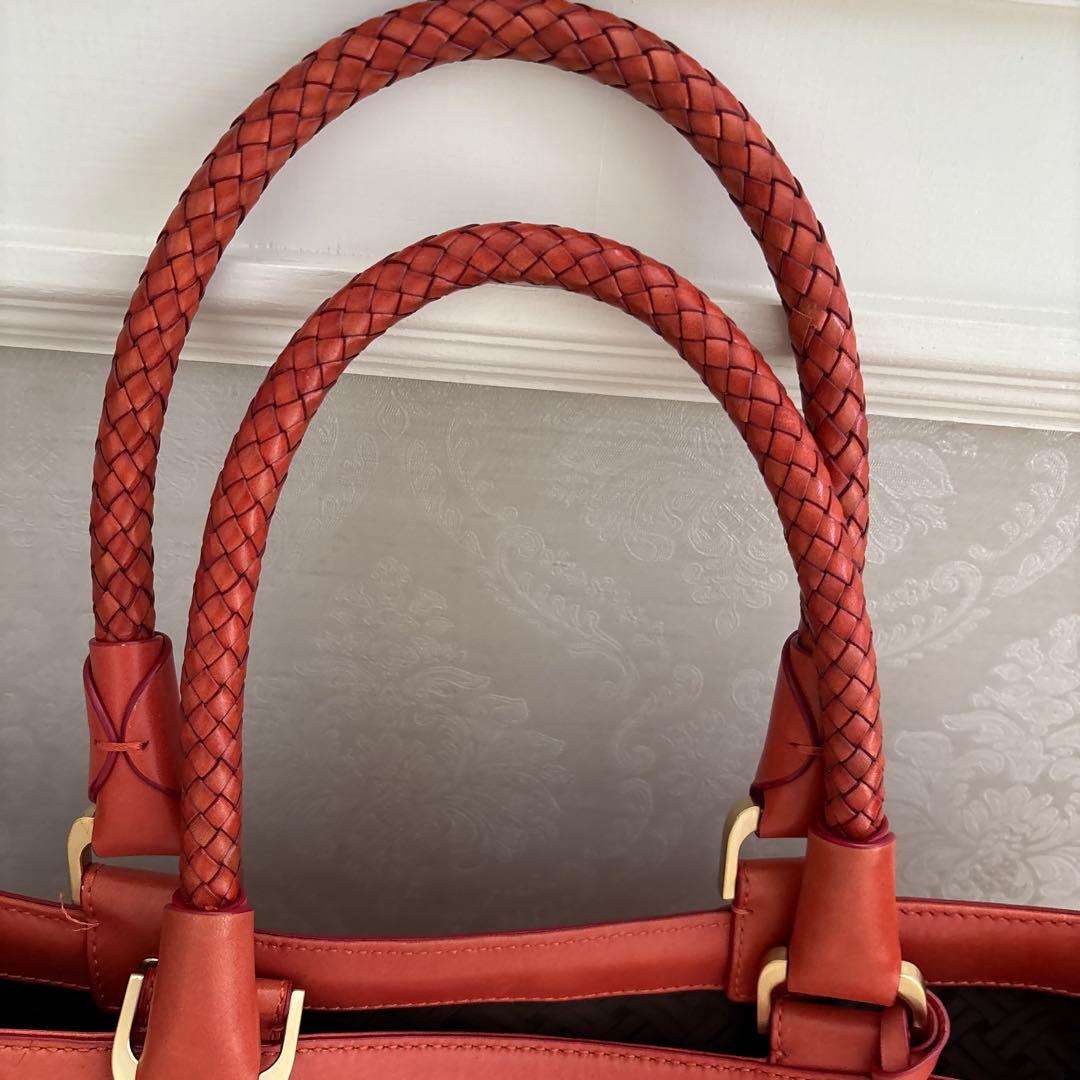 コールハンカゴ編みレザー トートバッグ オレンジ色 - メルカリ