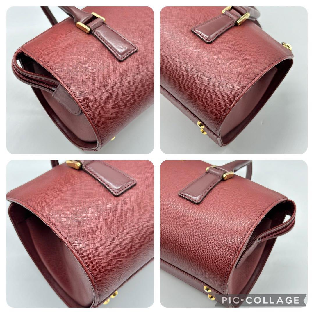 美品】バーバリー ハンドバッグ レザー ノバチェック 筒型 ロゴ