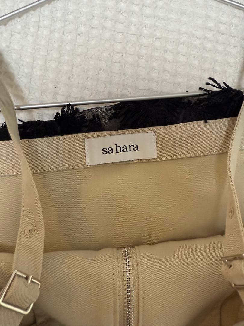 sahara Fluffy Layered Zip Top ベージュ - メルカリ