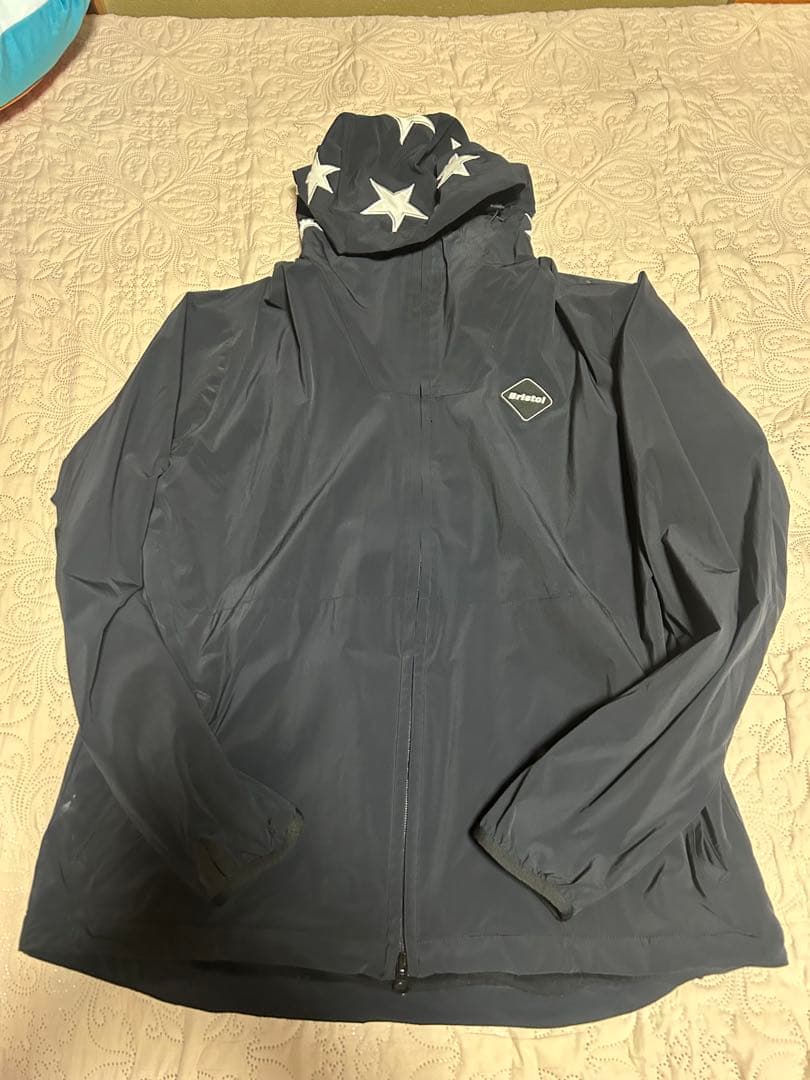 fcrb Bristol XL ブラックLYCRA HOODED BLOUSON F.C.Real Bristol（エフシーレアルブリストル）の「LYCRA HOODED