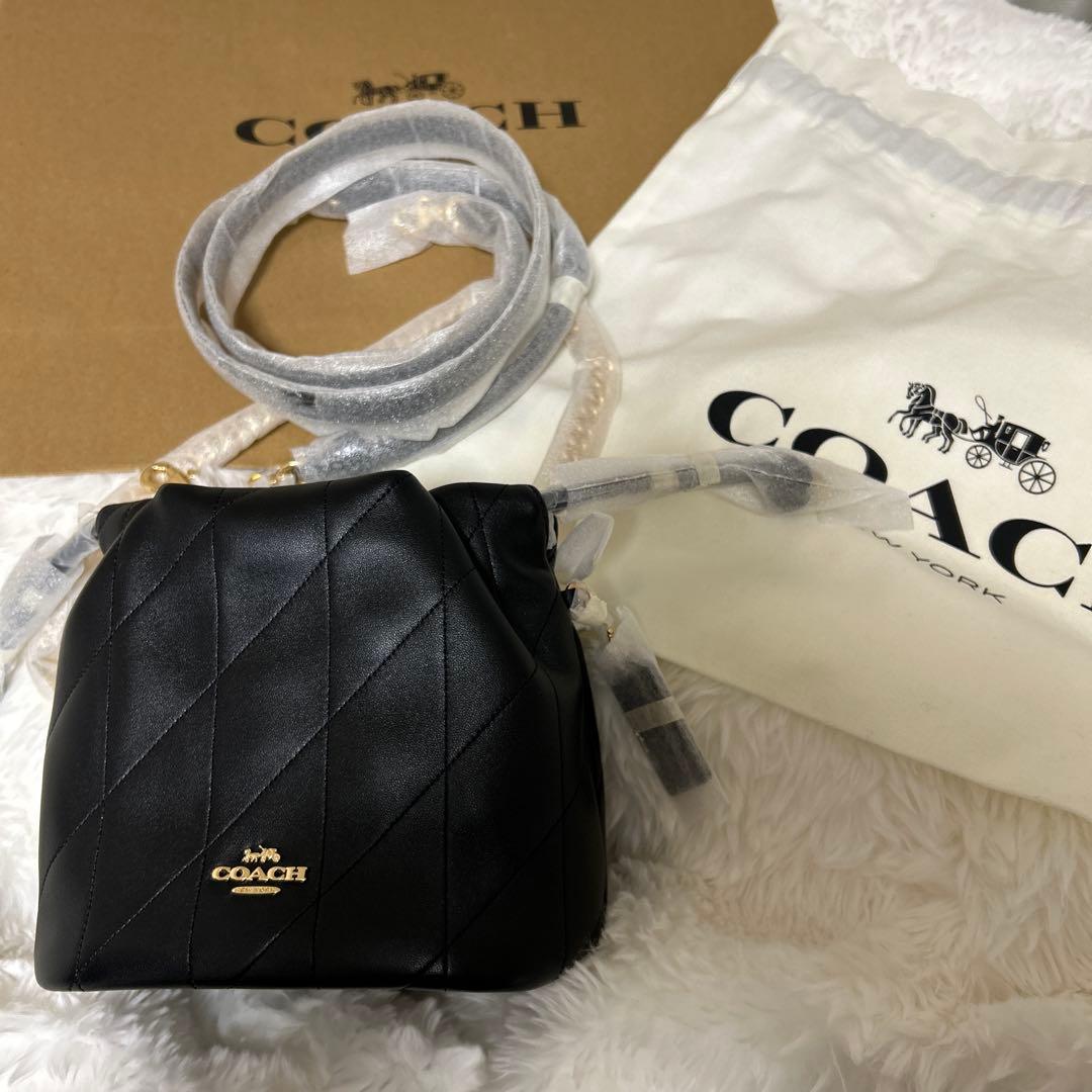 新品 COACH フェイ ミニ ドローストリング バッグ・キルティング 黒
