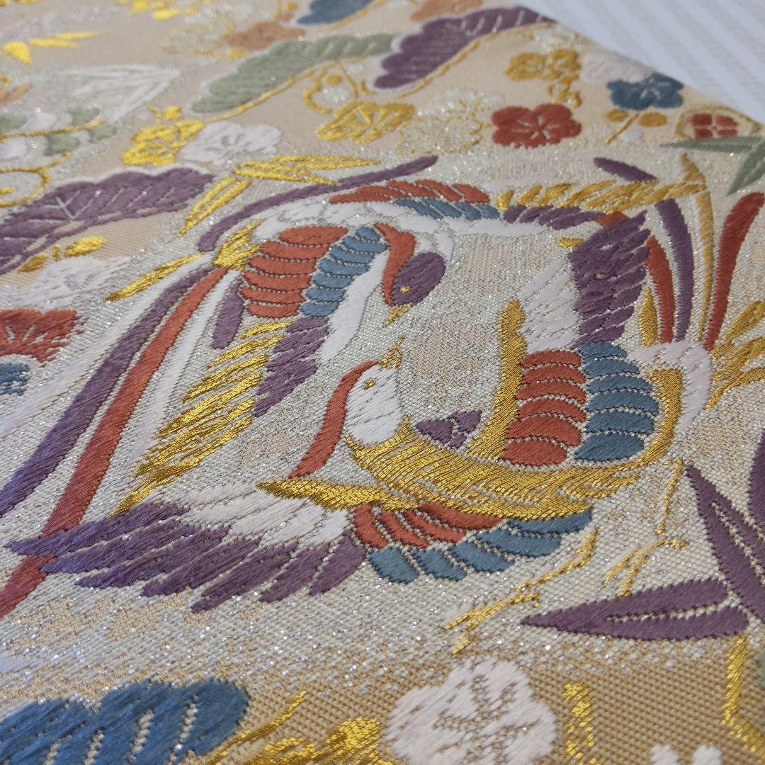 袋帯】幸せを結ぶ帯＊鳳凰と宝尽くしが織りなす西陣の華やぎ 生成り色