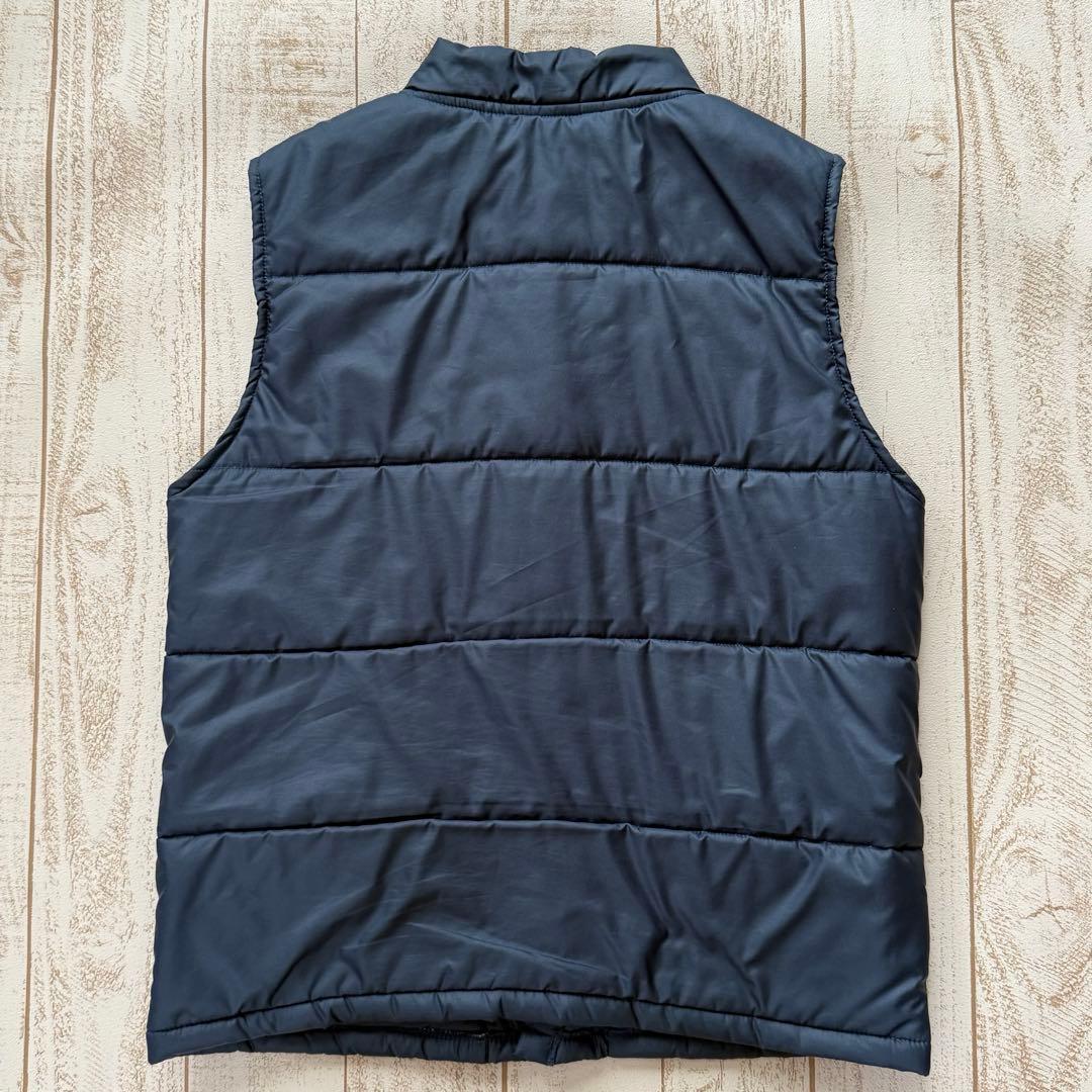 キャプテンズヘルム】レーシングチームベスト 中綿 ネイビー - メルカリ