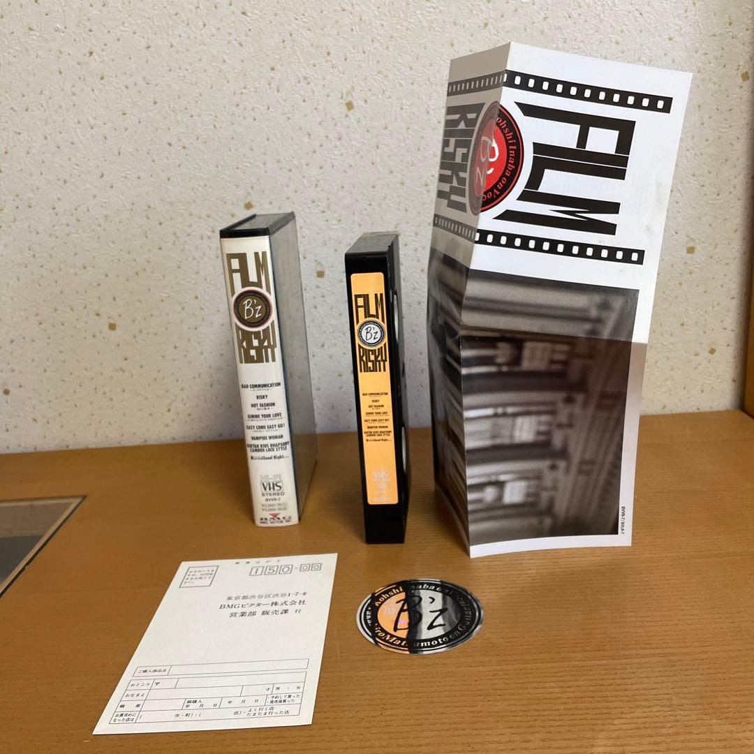 B'z 『FILM RISKY』 VHSビデオ ホログラムステッカー付き - メルカリ