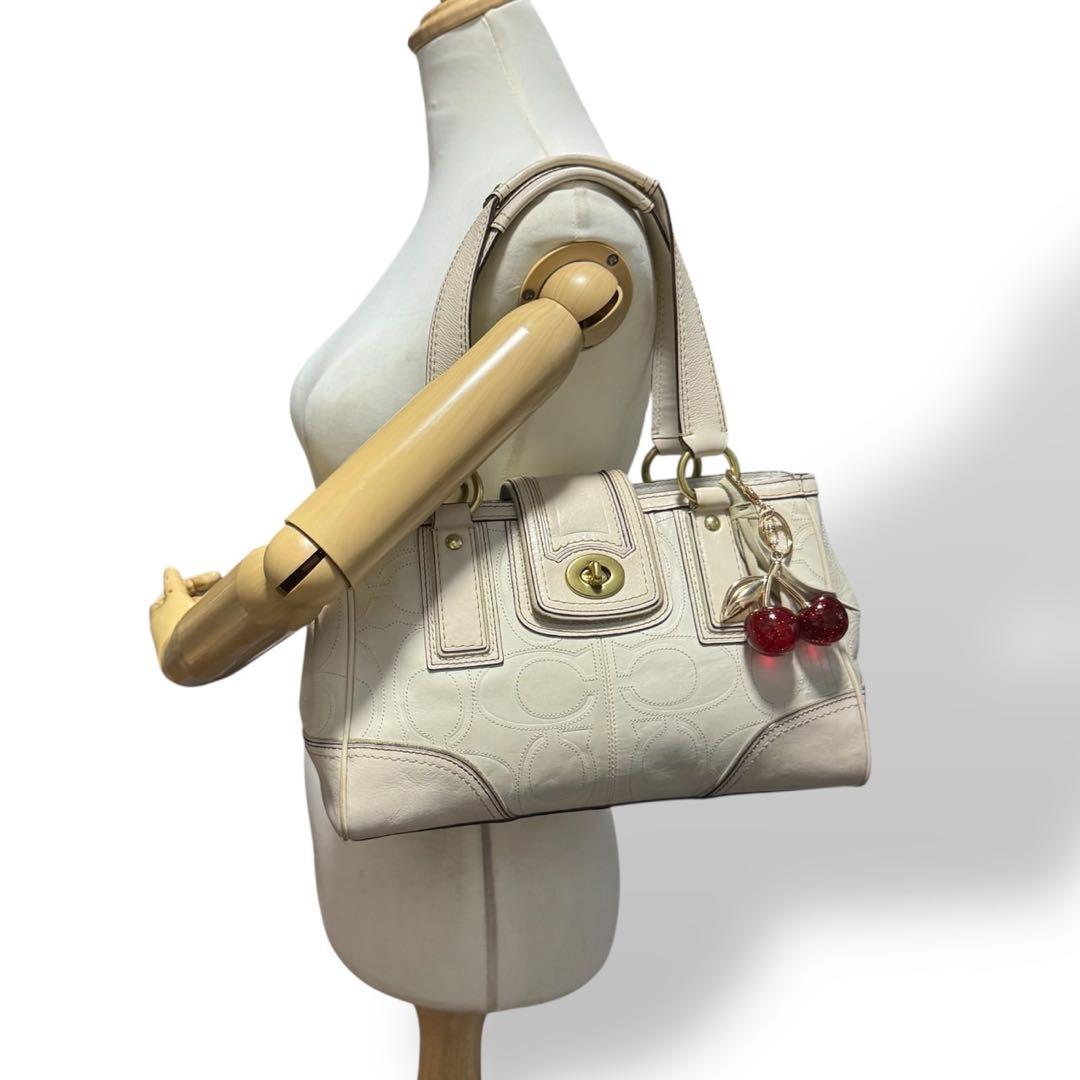 COACH Y2K Signature TurnLock Boston Bag - メルカリ