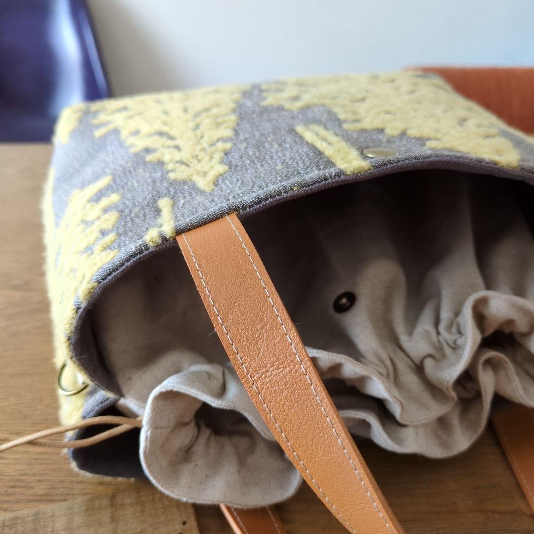 1575】あおりポケットの巾着バッグ＊ミナペルホネン