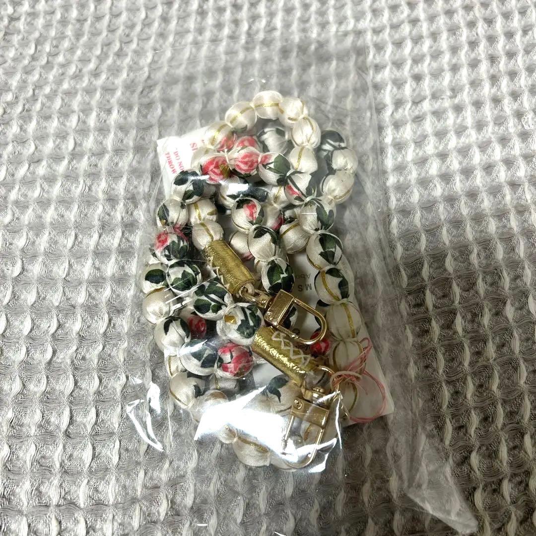 BEAMS COUTURE ルルメリーの携帯ストラップ - メルカリ