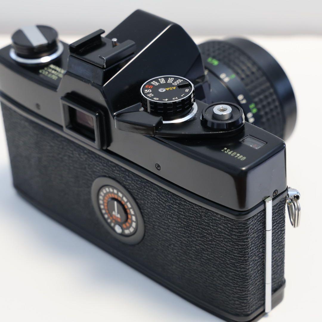 ミノルタSRT101ブラック ボディ フィルムカメラ レンズ付き - メルカリ