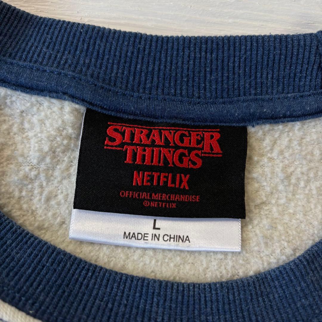ストレンジャーシングス ラグランスウェット Lサイズ ゴースト