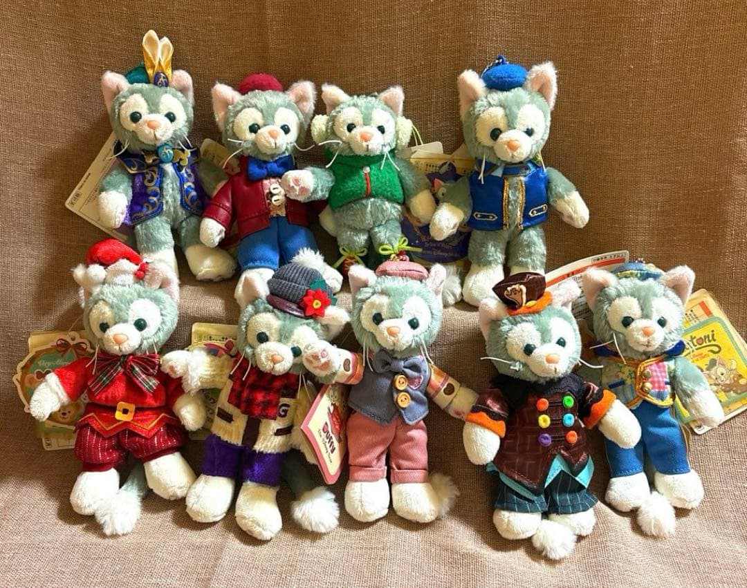 (未使用タグ付き)ディズニーぬいぐるみバッジ　ジェラトーニ　おまとめ９点 charmedlife_tdsrggt07