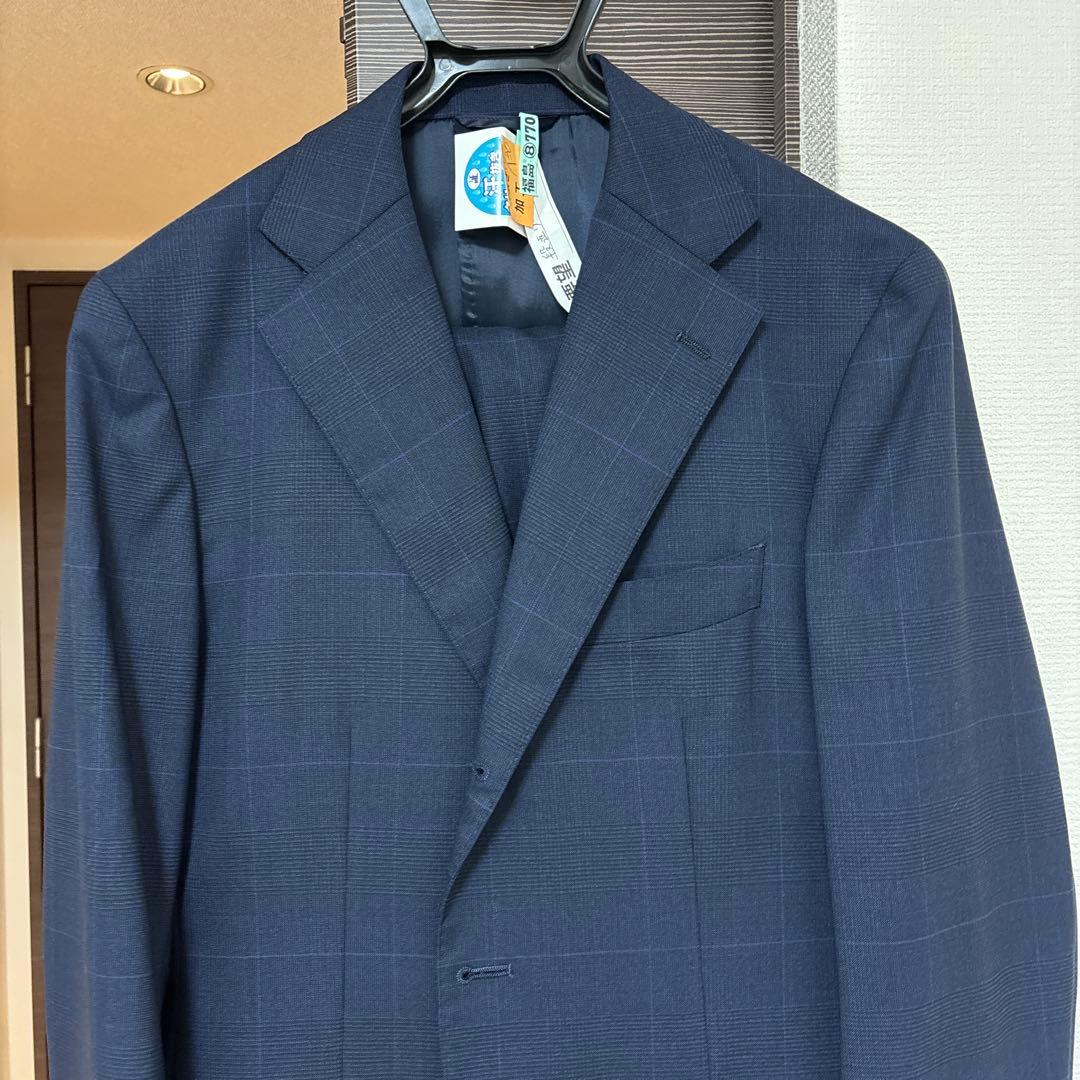 ユニバーサルランゲージ スーツ ネイビー チェック柄 - メルカリ