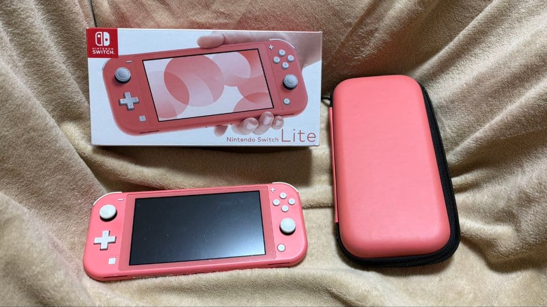 Nintendo Switch Lite コーラルピンクピンク Amazon.com: Nintendo Switch Lite - Coral - Switch : Video Games