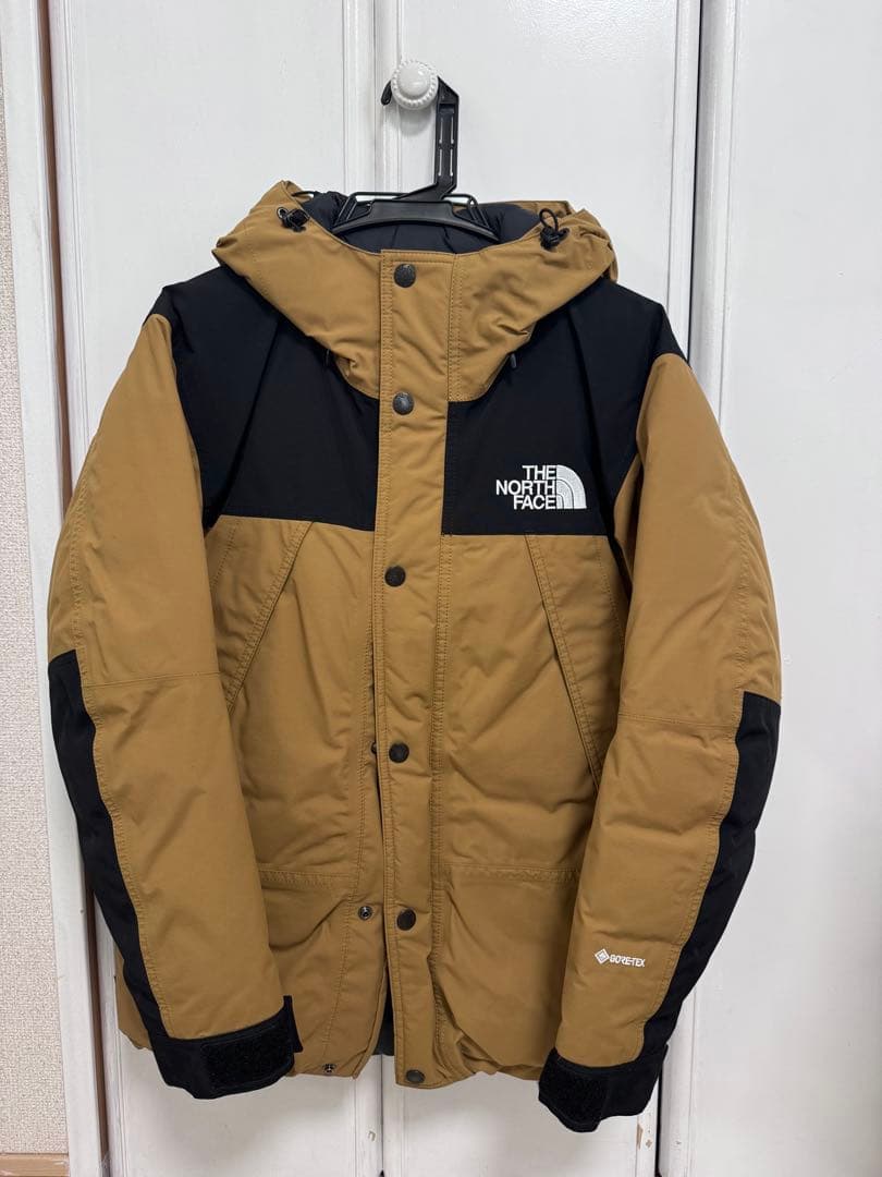 THE NORTH FACE マウンテンダウンジャケット ブラウン/ブラック ザ・ノース・フェイス マウンテンダウンジャケット ND92237 THE NORTH