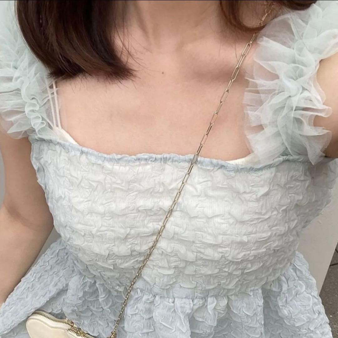 新品muguet fairly tulle pepulum blouseぺプラム - メルカリ