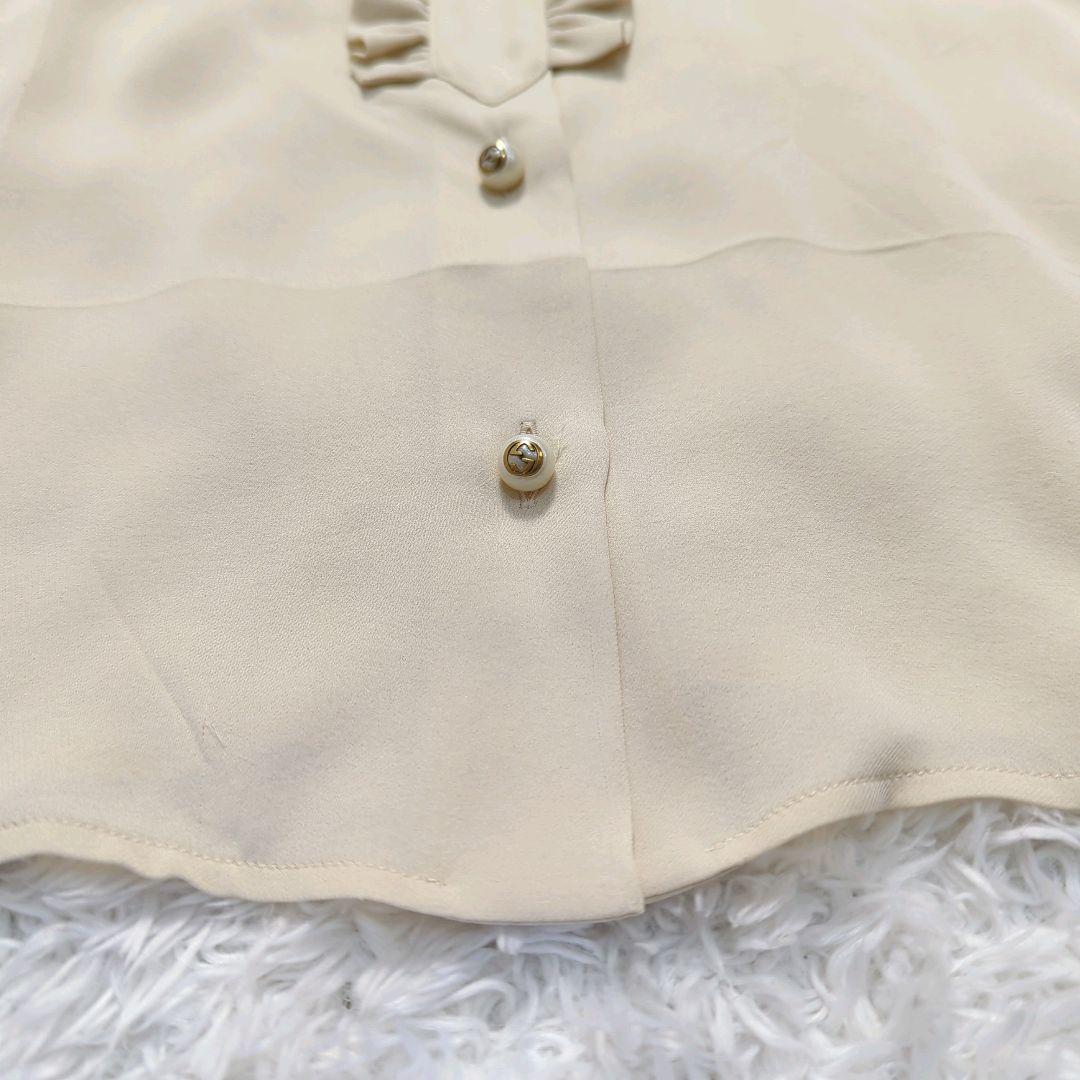 新品同様☆GUCCI☆GGパールボタン☆ボウタイ☆フリルブラウス☆ - メルカリ