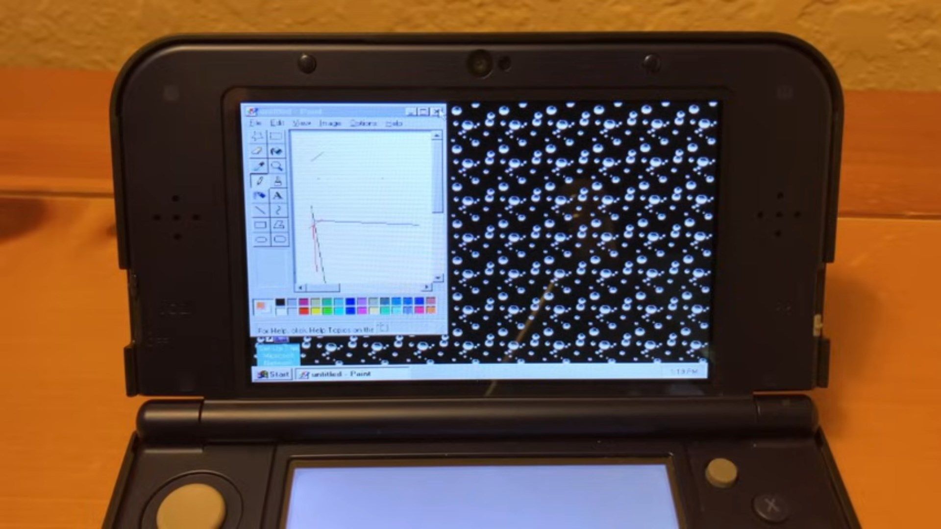 Someone got Windows 95 installed on a Nintendo 3DS, and it was a